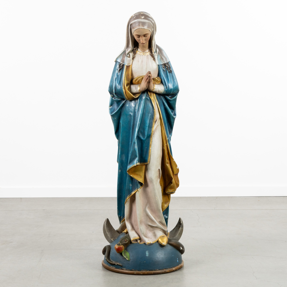 Madonna op de maansikkel en serpent, gepatineerd gips, 'Huis K. Dupon, Brugge'.  (L:40 x W:32 x H:113 cm)